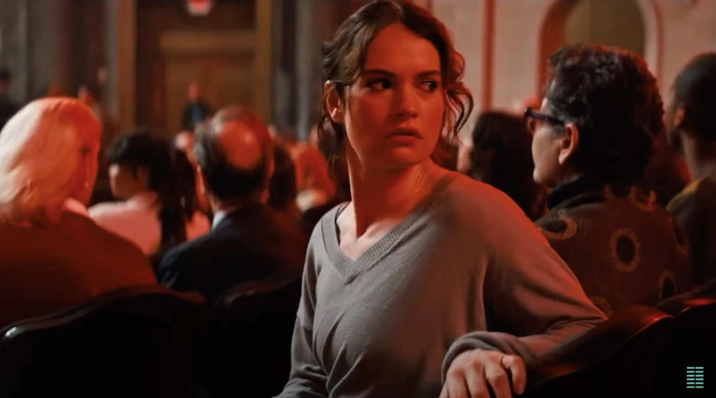 Riz Ahmed and Lily James are tangled in the corporate deception at the top of a trailer for the relay